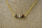 Gold and Stone Spinner Necklace
