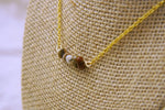 Gold and Stone Spinner Necklace